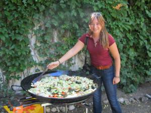 One kind chef let us help. Megan is giving the giant paella a good stir.